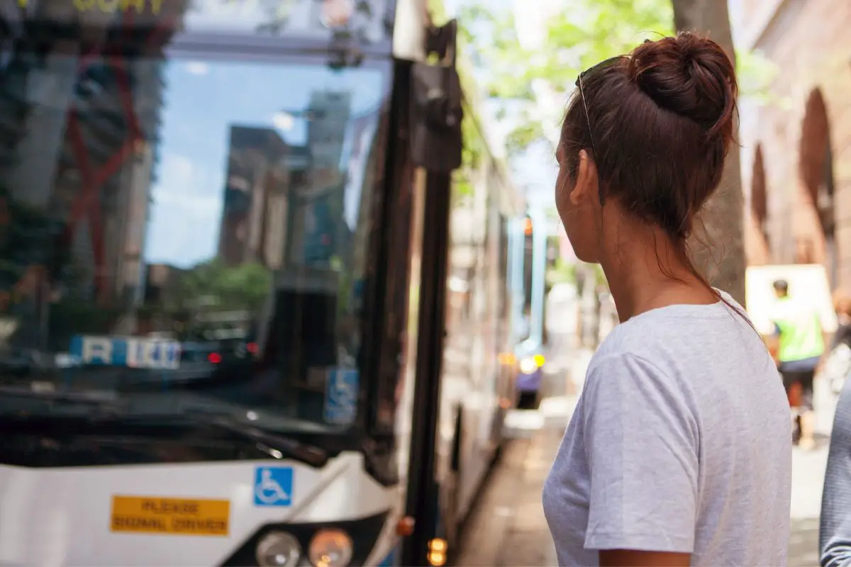 Hydrogen fuel buses - Person waiting for bus